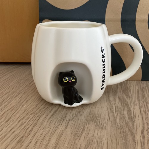 Starbucks peep black cat - starbucks,