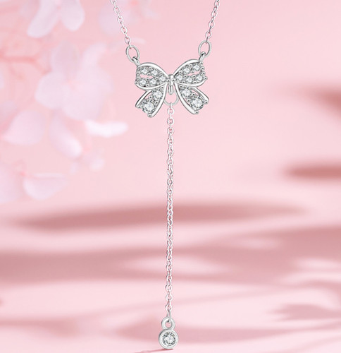 Dainty bow tassel pave - bow,