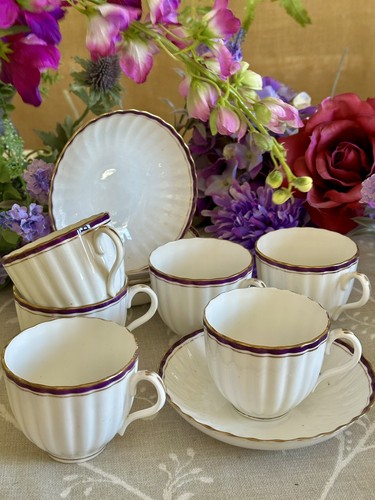 Six antique teacups and - six,