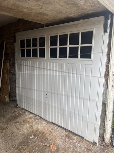 White and over garage - and, door