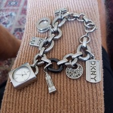 Ladies DKNY SO UNUSUAL  Watch With RARE LOT CHARMS ON BRACLET WOW FATOR 