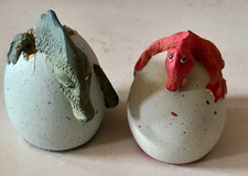 Two small Genesis Creations baby dragon hatchlings/draglets on eggs.