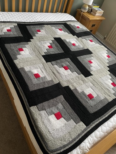Hand knitted log cabin - log,