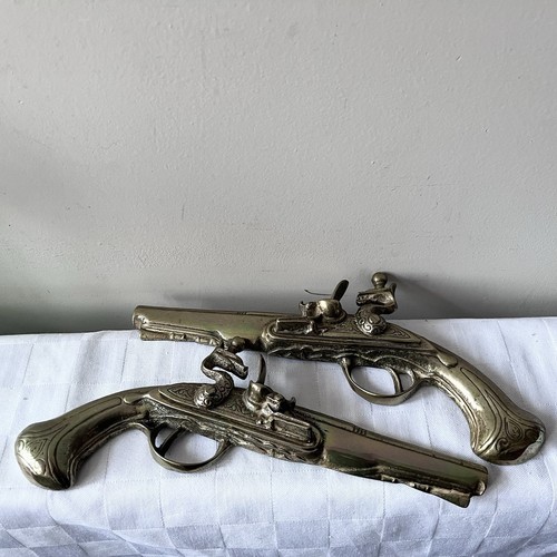 Vintage pair brass flintlock - pair,