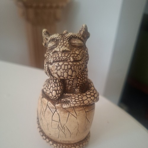 Vintage dragon hatching from - vintage,