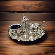 silver-plated cruet set on a