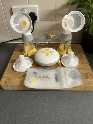 Medela breast pump - medela,