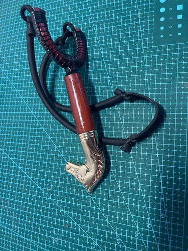 Brass horse head catapult