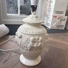 Vintage painted cherub table