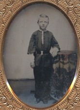 Young Man Standing Next Table
