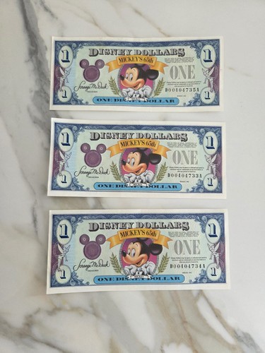 Three 1993 disney dollar - three,
