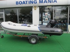 Yamaha Yam Rib with 9.8 HP Tohatsu outboard and trailer