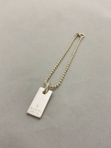 Gucci logo plate - gucci,