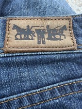 Levi's 629 Bootcut blue jeans 27 by 34 Y2K zip back pocket detail