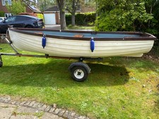 Open rowing fishing boat - fishing,