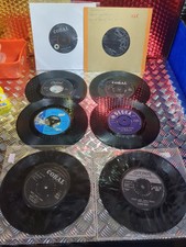 vinyl records X8 45's Please