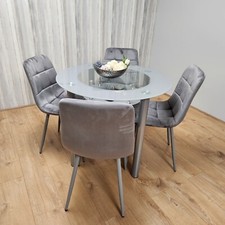 Round Glass Grey Dining Table With Storage Shelf And 4 Grey Tufted Velvet Chairs