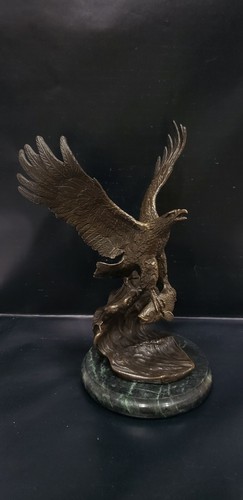 Bronze eagle fishing - eagle, statue
