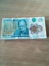 Five pound note - five, with