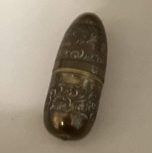 Ornate metal bullet shaped - ornate, bullet-shaped