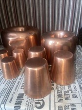 Collection of vintage copper dariole jelly moulds 