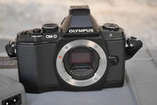Olympus OM-D E-M5 Black  body, with charger, batteries etc. Excellent condition