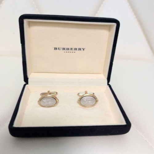 Burberry gold oval - horse, logo