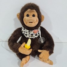 Vintage HOSUNG Chimp Baby With Animal Print Outfit, Dummy, Squeaks, Sucks Thumb