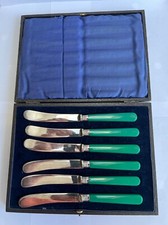 6 mid century butter knives, green bakelite handles. Original box