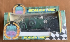 Scalextric the power and - ‘,