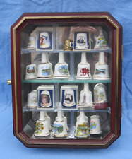 MINIATURE WOOD MIRRORED THIMBLE DISPLAY CABINET AND 19 ASSORTED CHINA THIMBLES