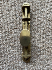 Antique brass rack pulley for