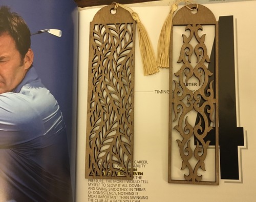 Two wooden bookmarks with - wooden,