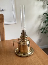 A Brass Wall Back Hand Oil Lamp.