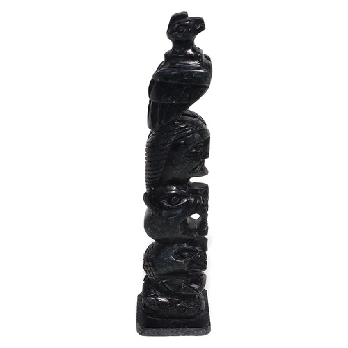 Vintage carved stone totem - stone,