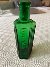 VINTAGE 2oz GREEN GLASS "NOT