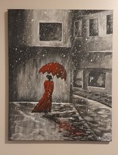 Lady walking through a rainy