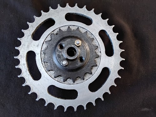 Motorcycle chain wheel and - wheel,
