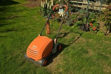Orange Flymo Lawnrake compact 3400