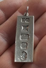 STERLING (.925) SILVER INGOT / PENDANT. 15.5 GRAMS. HALLMARKED BIRMINGHAM 1977.