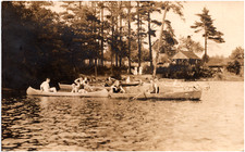 People Rowing Boats near Shore
