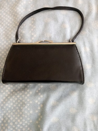 Black doctor bag with a - black, doctor's