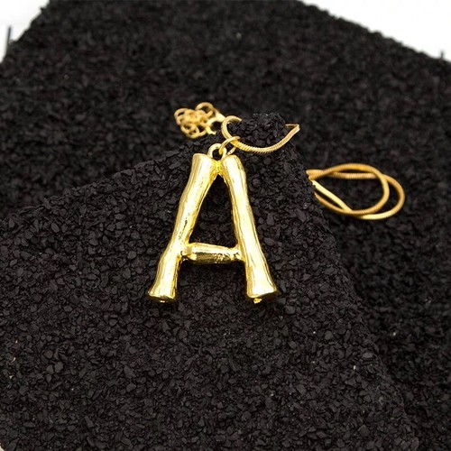 Large gold letter - large,