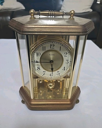 Benchmark brass mantle clock - benchmark,