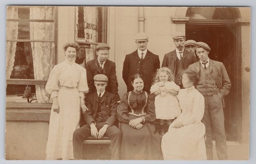 Antique family group outside - family,