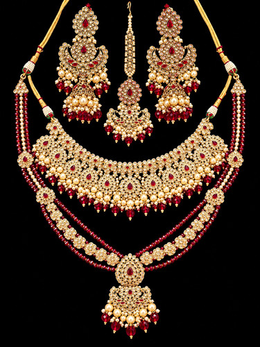 Maroon and gold kundan - and,