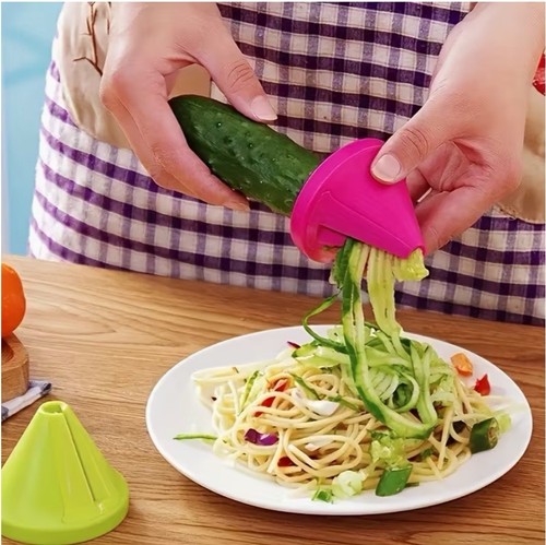 Hand held vegetable spiralizer - hand,
