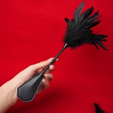 Feather slave paddle spanking - feather,