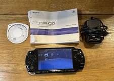 PSP 3000 Black With Original Instructions, FIFA 10, Charger & New Battery