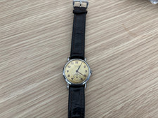 Invicta 15 RUBIS wrist watch from 40's - 50's Still works. Leather strap.